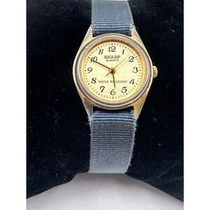 Womens Sharp Quartz Watch‎ Water Resistant Gold Tone Blue Band Analog
